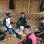 Babinsa Desa Cibatu Komsos dengan Ketua RT/RW Bahas Keamanan dan Ketertiban Lingkungan