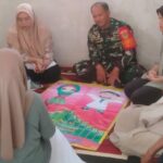 Babinsa Kebonmanggu Koramil 0607-09/Cisaat Komsos dengan Kader Posyandu