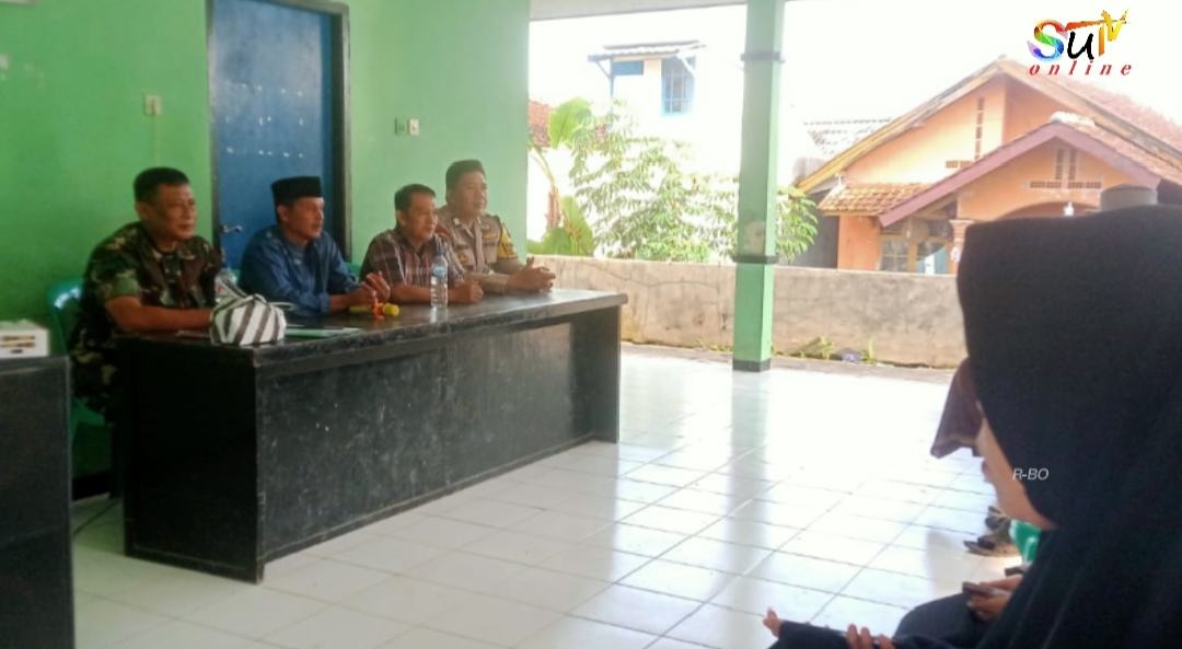 Babinsa Desa Sukamanis Koramil 09/Cisaat Hadiri Rapat Koordinasi Tingkat Desa