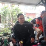 Babinsa Desa Selajambe Komsos dengan Linmas Tingkatkan Keamanan di Wilayah Binaan